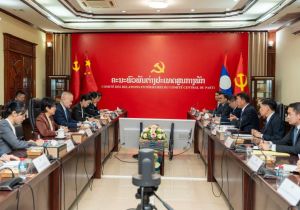 Minister of the International Department of the CPC Central Committee Holds Talks with Head of the LPRP Central Committee's Commission for External Relations