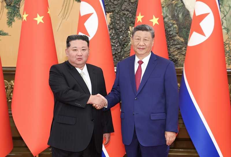 Chinese President Xi Jinping Holds Talks with President of the State Affairs of North Korea Kim Jong Un